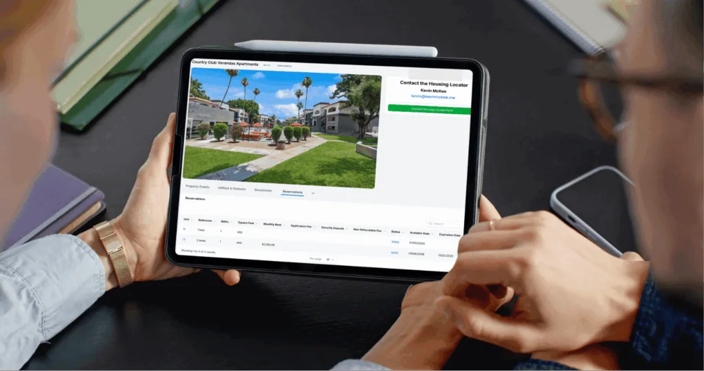 Tablet displaying reserved housing units within a coordinated housing search